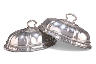 A PAIR OF GEORGE III SILVER DISH COVERS, by Thomas Heming, London 1771, sha