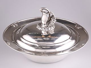A DANISH STERLING SILVER VEGETABLE DISH AND COVER, by Georg Jensen, pattern