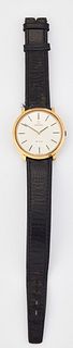 A GENTLEMAN'S GOLD-PLATED OMEGA STRAP WATCH,?circular silver dial with blac