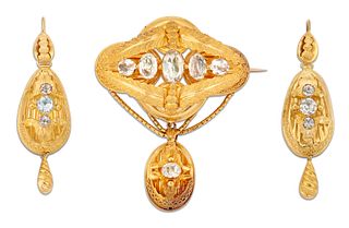 A MID 19TH CENTURY BROOCH AND EARRINGS SUITE, the brooch set with graduated