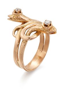 A DIAMOND SNAKE RING, entwined snakes each set with a round brilliant-cut d