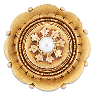 A VICTORIAN SPLIT PEARL BROOCH, a split pearl within a leaf border and a ti