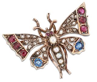 A VICTORIAN DIAMOND AND GEMSTONE BUTTERFLY BROOCH, the body set with split 