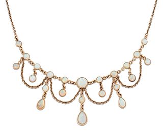 AN EDWARDIAN STYLE OPAL NECKLACE, graduated round opals in bezel settings, 