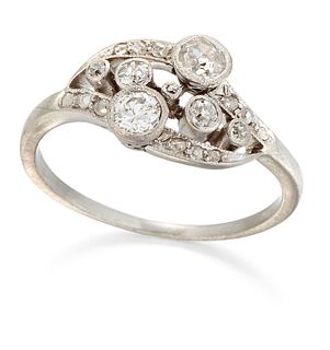 A DIAMOND RING, milgrain set old-cut diamonds between diamond set crossover