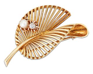 A DIAMOND AND PEARL LEAF BROOCH, the stylised leaf of pierced design and to
