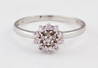 A 9 CARAT WHITE GOLD PINK STONE AND DIAMOND CLUSTER RING, set throughout wi