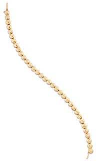 A DIAMOND BRACELET, domed circular links each inset with a round brilliant-