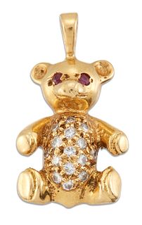 AN 18 CARAT GOLD DIAMOND AND RUBY TEDDY BEAR, the belly pav?-set with round