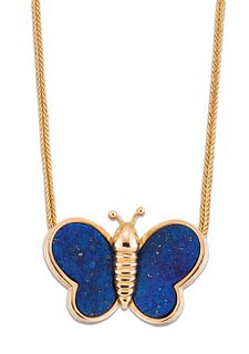 A LAPIS LAZULI BUTTERFLY PENDANT ON CHAIN, the stylised butterfly with lapi