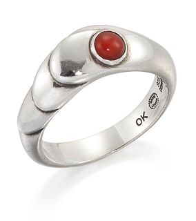 OLE KORTZAU FOR GEORG JENSEN - A DANISH SILVER CORAL RING, no. 362,?a round