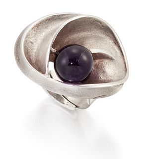 MATTI J. HYV?RINEN?- A FINNISH SILVER AND AMETHYST RING, the scrolling oval