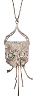 A MODERNIST SILVER PENDANT ON CHAIN, the abstract shield-shaped pendant wit
