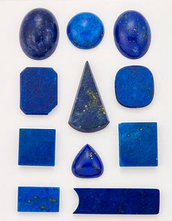 ELEVEN PIECES OF WORKED LAPIS LAZULI, including oval cabochons. (11)