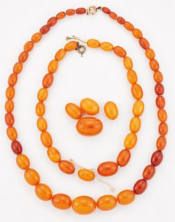 A GRADUATED AMBER BEAD NECKLACE, length 50cm, 30.0 grams; and?A BROKEN STRA