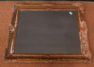 An 18th century carved wood picture frame with later mirror plate <br> <br>