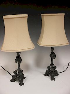 A pair of spelter 'armour' shaped base table lamps, 55cm high <br> <br>