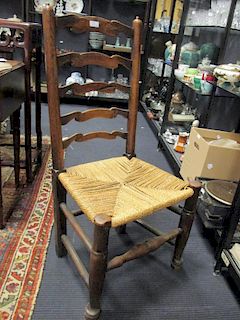 A set of six elm ladder back dining chairs with woven seagrass seats <br> <br>