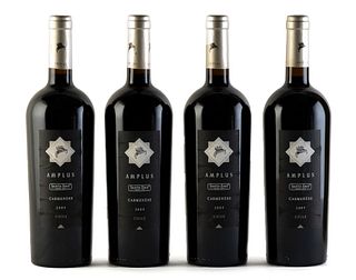 Four Amplus Santa Ema bottles, vintage 2004.
Category: red wine, Carmenère. D.O. Valle de Cachapoal. Maipo Island (Chile).
Level: A.
750 ml.
