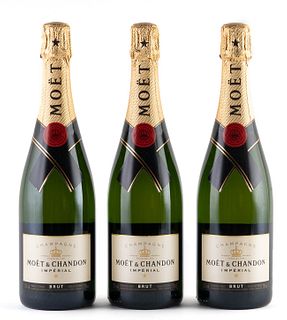 Three bottles Moët & Chandon Brut Impérial.
Category: Brut champagne. Épernay, Champagne.