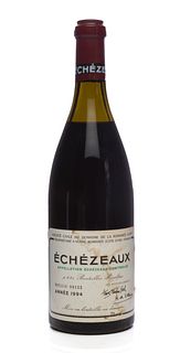 A bottle of Échezeaux, Domaine de la Romanée Contí, Vintage 1994.
Grand Cru.
Category: red wine. Vosne-Romanée, Còte d'Or (France).
Level: C-D.
Bottle