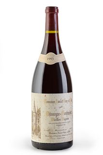 A Magnum bottle of Domaine Amiot Guy et Fils, Grand Crú Vielles Vignes, vintage 1993.
Category: red wine. Chassagne Montrachet, Côte d'Or (France).
Le