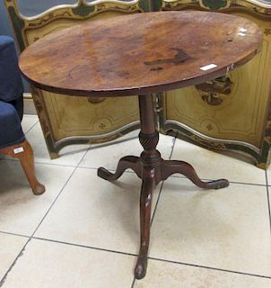 A George III mahogany tripod table with wrythen moulded column, 68 x 71cm diameter <br> <br>