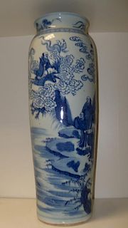 A Kangxi style blue and white vase, a cavetto neck and rounded shoulders above the tapering cylindri