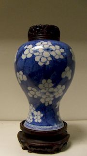 A blue and white meiping, period of Kangxi, painted with groups of spring cherry blossoms resting on