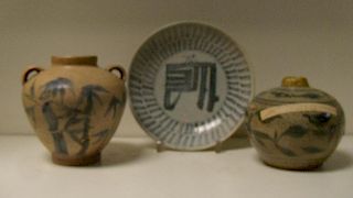 Two Ming blue and white jarlets and a dish, the first with a crackled glaze covering painting of fol