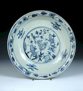 A 17th/18th century Swatow blue and white dish, centrally painted with a deer reclining between two