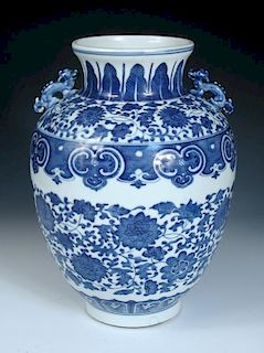 A Ming style blue and white vase, four character mark of Kangxi, the dragon handles on the shoulders