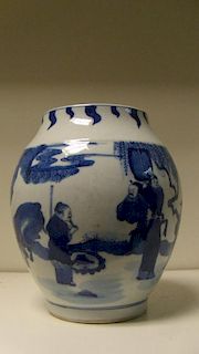 A Kangxi style blue and white vase, the ovoid body painted with a group of dignitaries gathered belo
