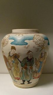 A late 19th/early 20th century Satsuma jar painted with nine dignitaries standing in attendance on a