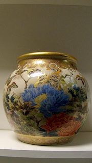 Taizan, an early 20th century Satsuma jar, the rounded exterior painted with butterflies amongst peo
