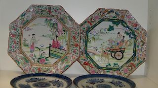 A pair of Japanese famille rose octagonal plates together with a pair of 19th century Chinese blue a