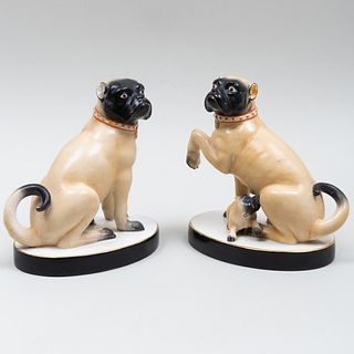 Continental Porcelain Mating Pair of Pugs and a Puppy 