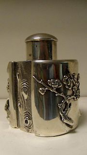 Hung Chong & Co', Shanghai, c.1900, a silver tea caddy and cover modelled as a section of tree trunk