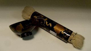 A lacquer make up brush and a bowl for tooth black, the black cylindrical handle to the double ended