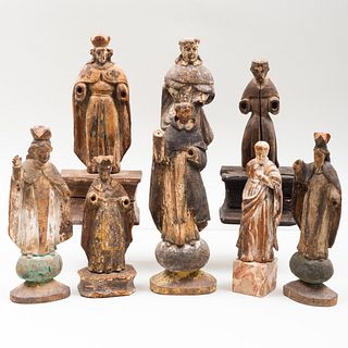Group of Eight Carved and Polychromed Devotional Figures