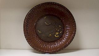 An earlier 20th century copper bordered bronze centred basket, the latter inlaid with a carp leaping