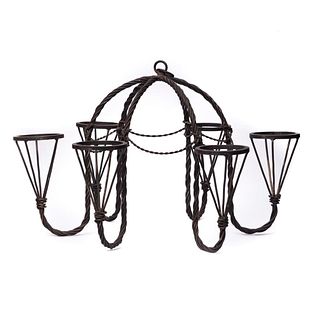 Vintage wrought iron chandelier with 6 holders for oil lamps.