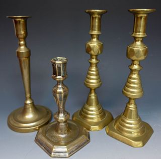 Four English Brass Candlesticks