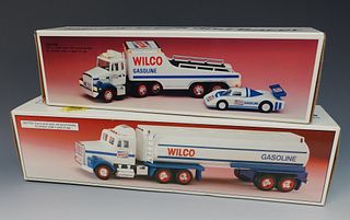 Two Wilco Toy Trucks