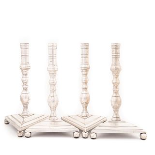 SET OF FOUR BAROQUE STYLE SILVERPLATE CANDLESTICKS