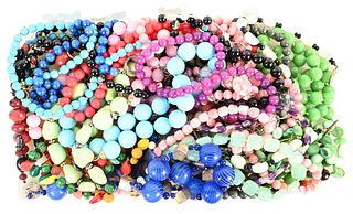 Large Group of Stone and Glass Beaded Necklaces, to include glass fruit, green stone, most having silver clasps.