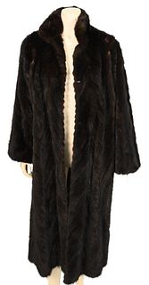 Vintage Herringbone Brown Mink Coat, having bell sleeves, stand up collar and front slip pockets, missing lining, fur is supple, size large.