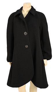 Giorgio Armani Black Quilted Swing Coat, having jeweled buttons, notched collar and slightly gathered sleeves, size large, excellent condition with mi