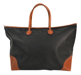 Bottega Veneta Large Black Leather Travel Bag, having black leather, brown accents, double handle, brass feet, interior zip pocket, in pre-owned condi