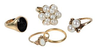 Group of Five 14 Karat Gold Rings, to include two mounted with pearls, 15.5 total grams.